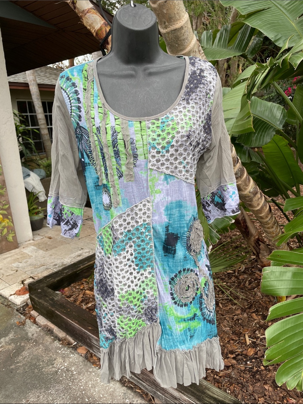 Fleur de lia patchwork, sheer mesh, and ruffled asymmetric mini dress